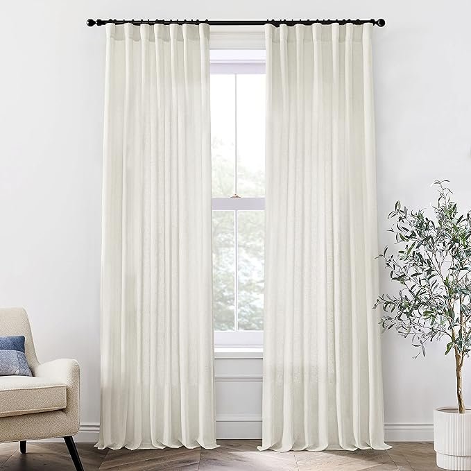 Sheer drapes allow for natural light to come in for a healthy morning routine for summer.