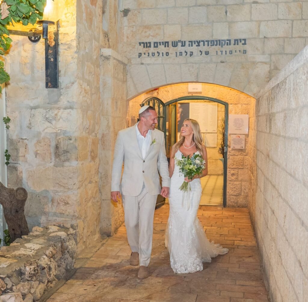 walking down the aisle at our wedding in Jerusalem, Israel
