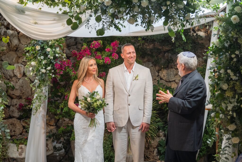 rabbi with bride and groom at our wedding in Jerusalem, Israel