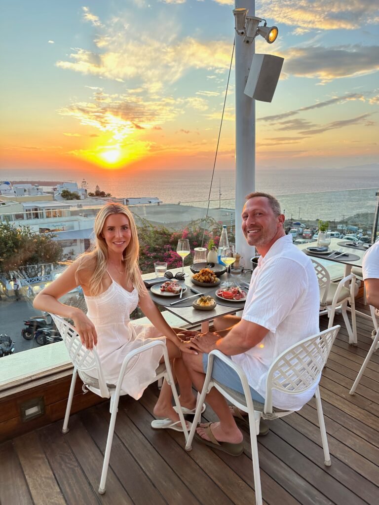 Rooftop dinner at Sunset in Santorini Greece on Honeymoon